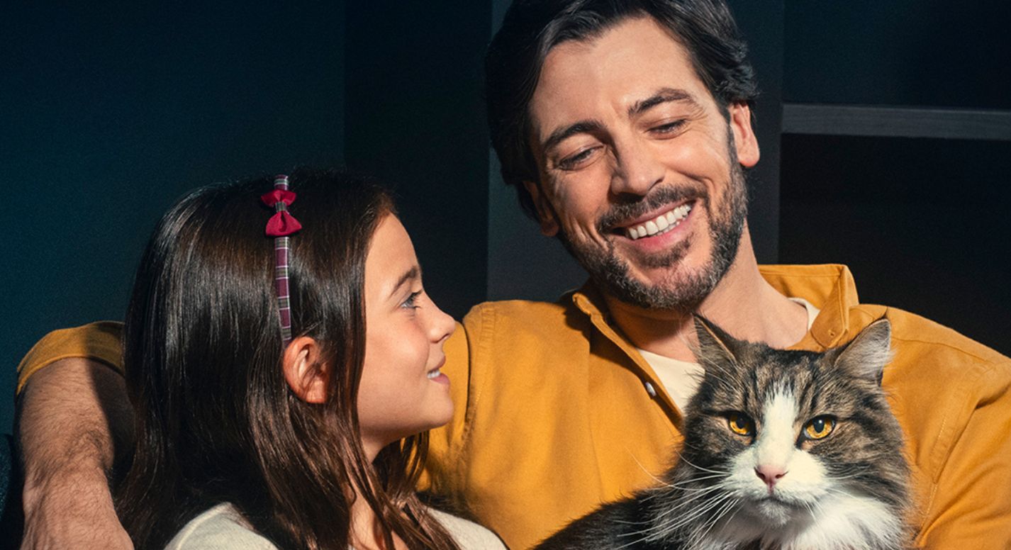 Father and Daughter with a cat